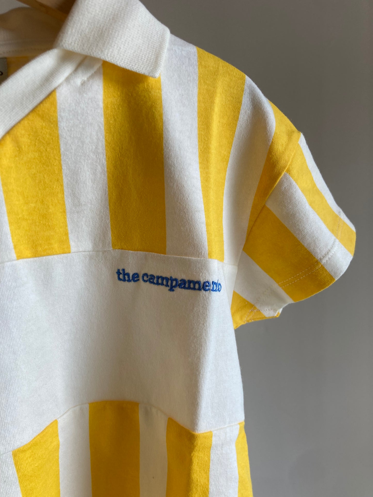 the campamento / yellow stripe polo