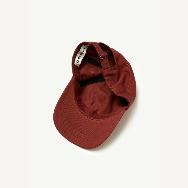 main story / cap brick