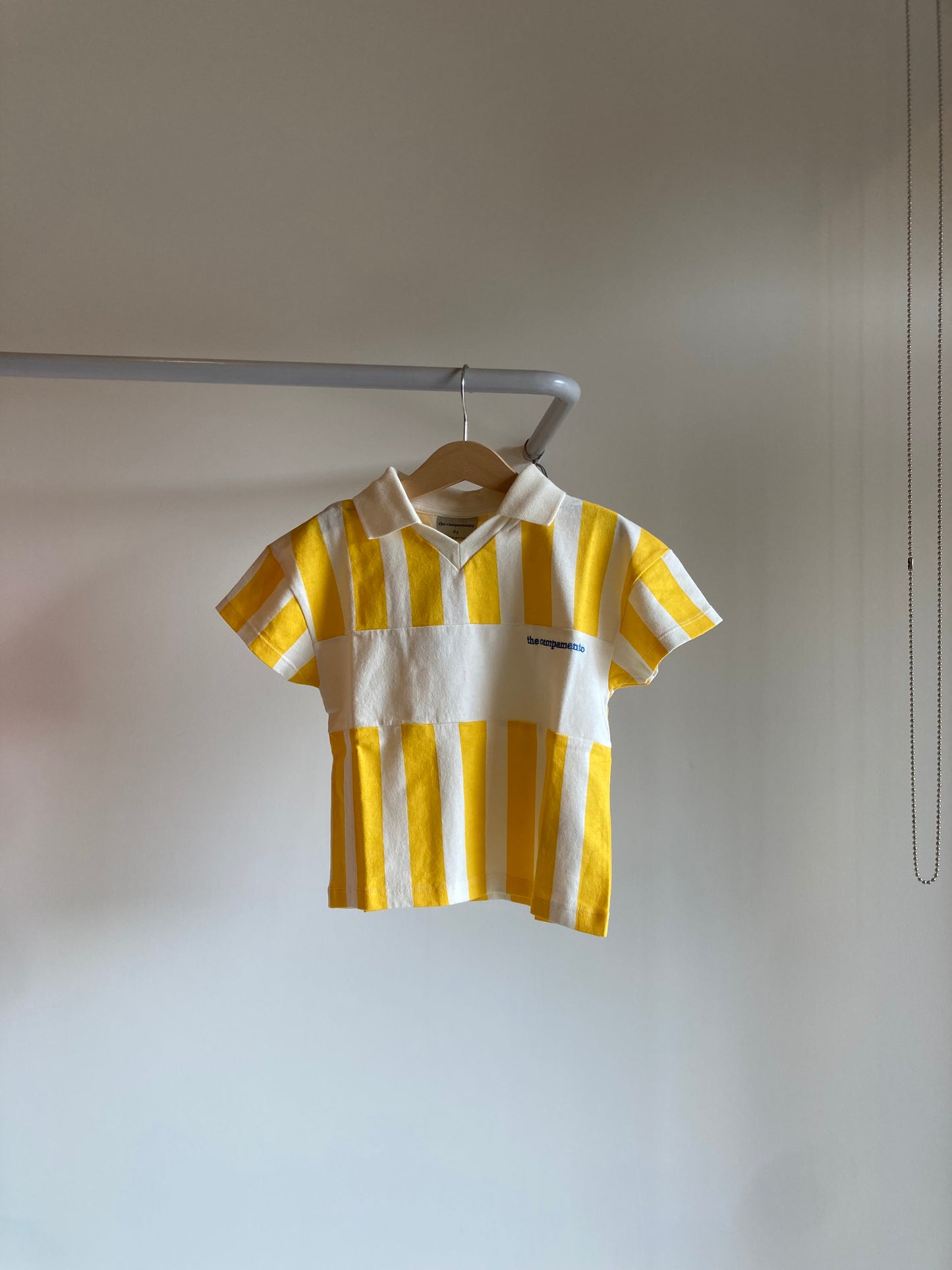 the campamento / yellow stripe polo