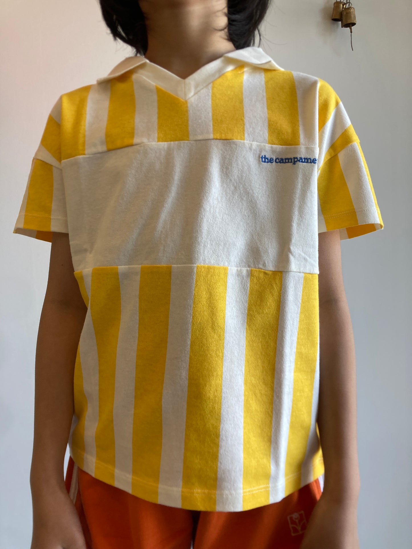 the campamento / yellow stripe polo