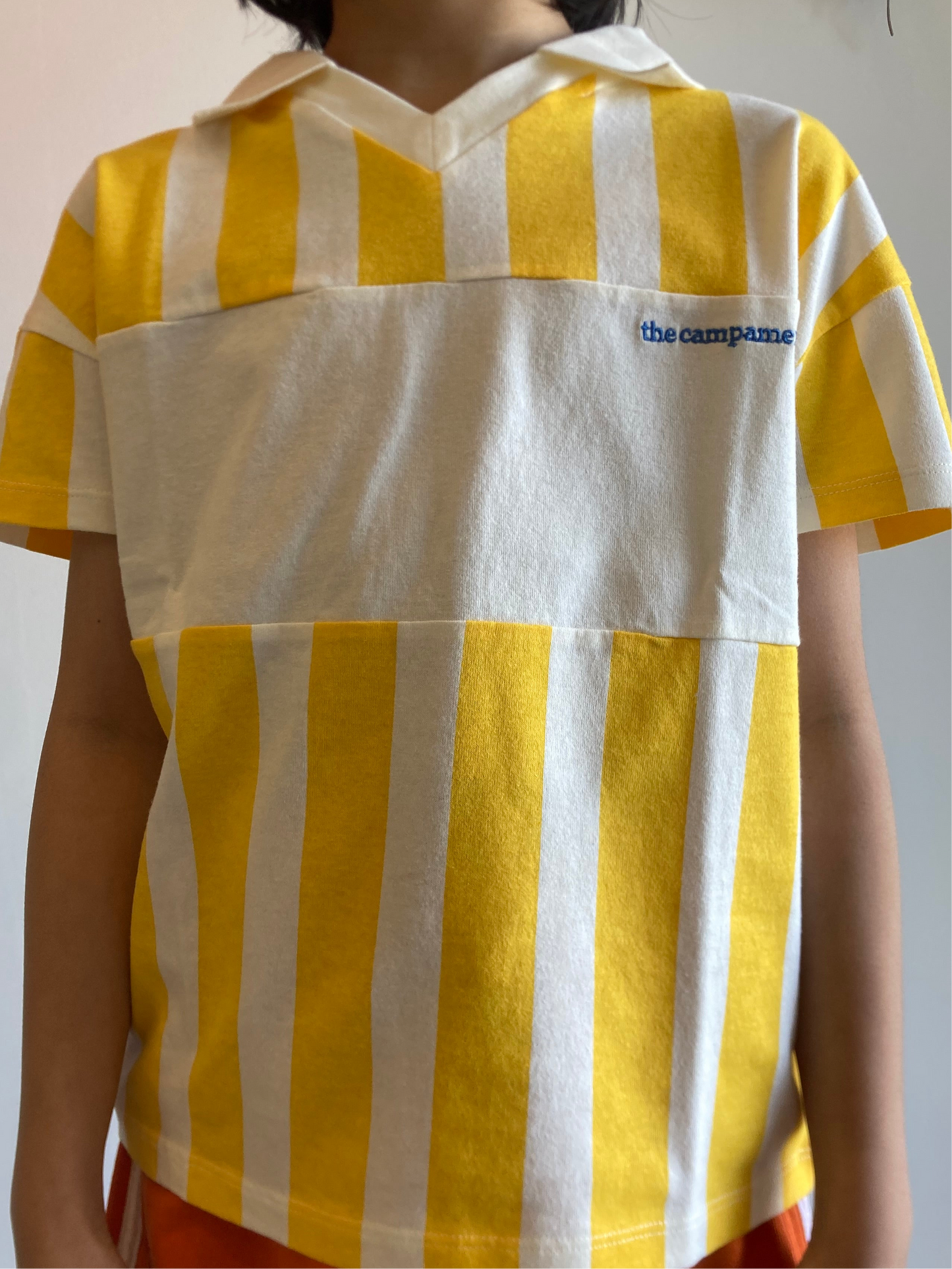 the campamento / yellow stripe polo