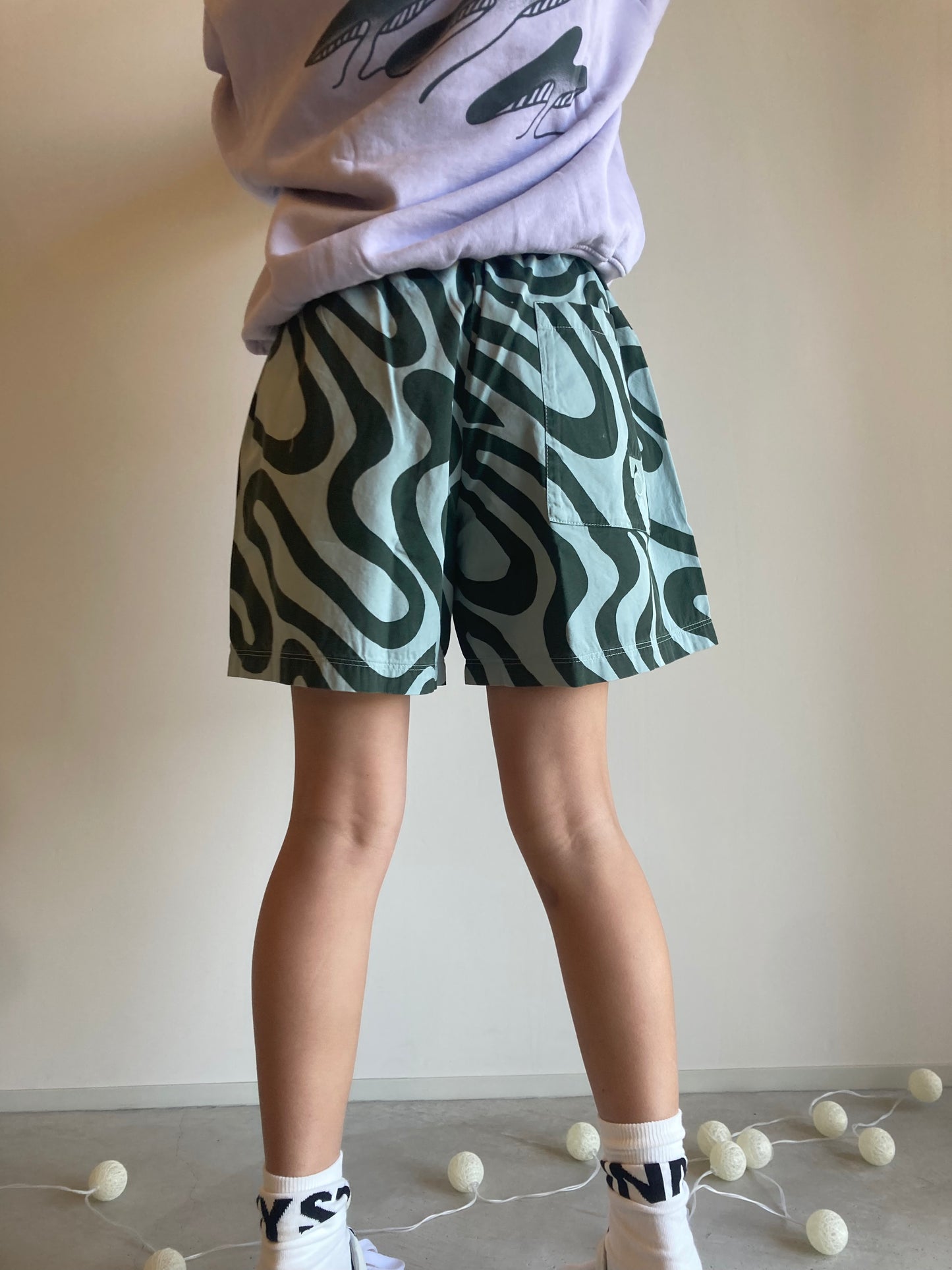 main story / woven short aqua gray