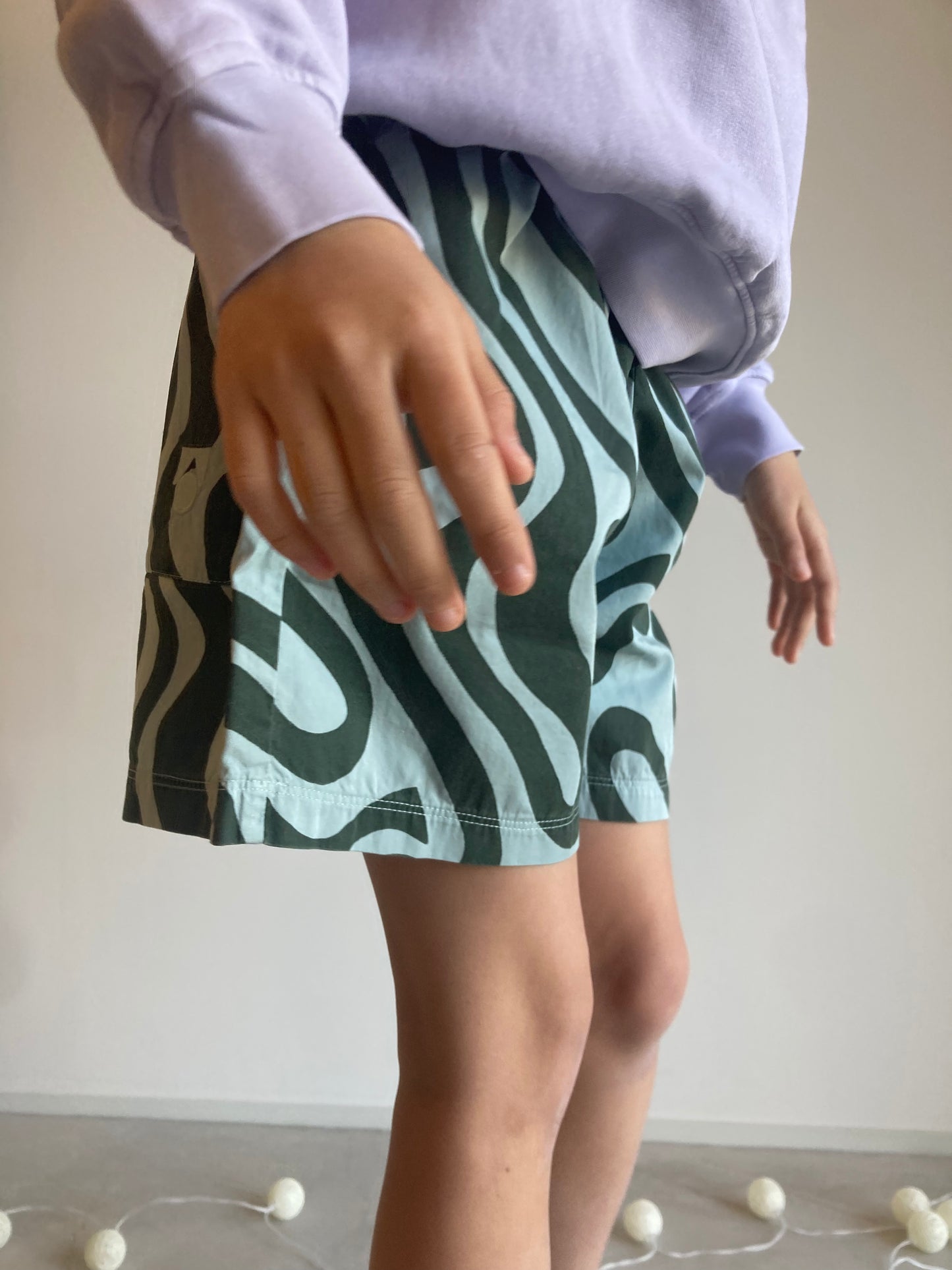 main story / woven short aqua gray