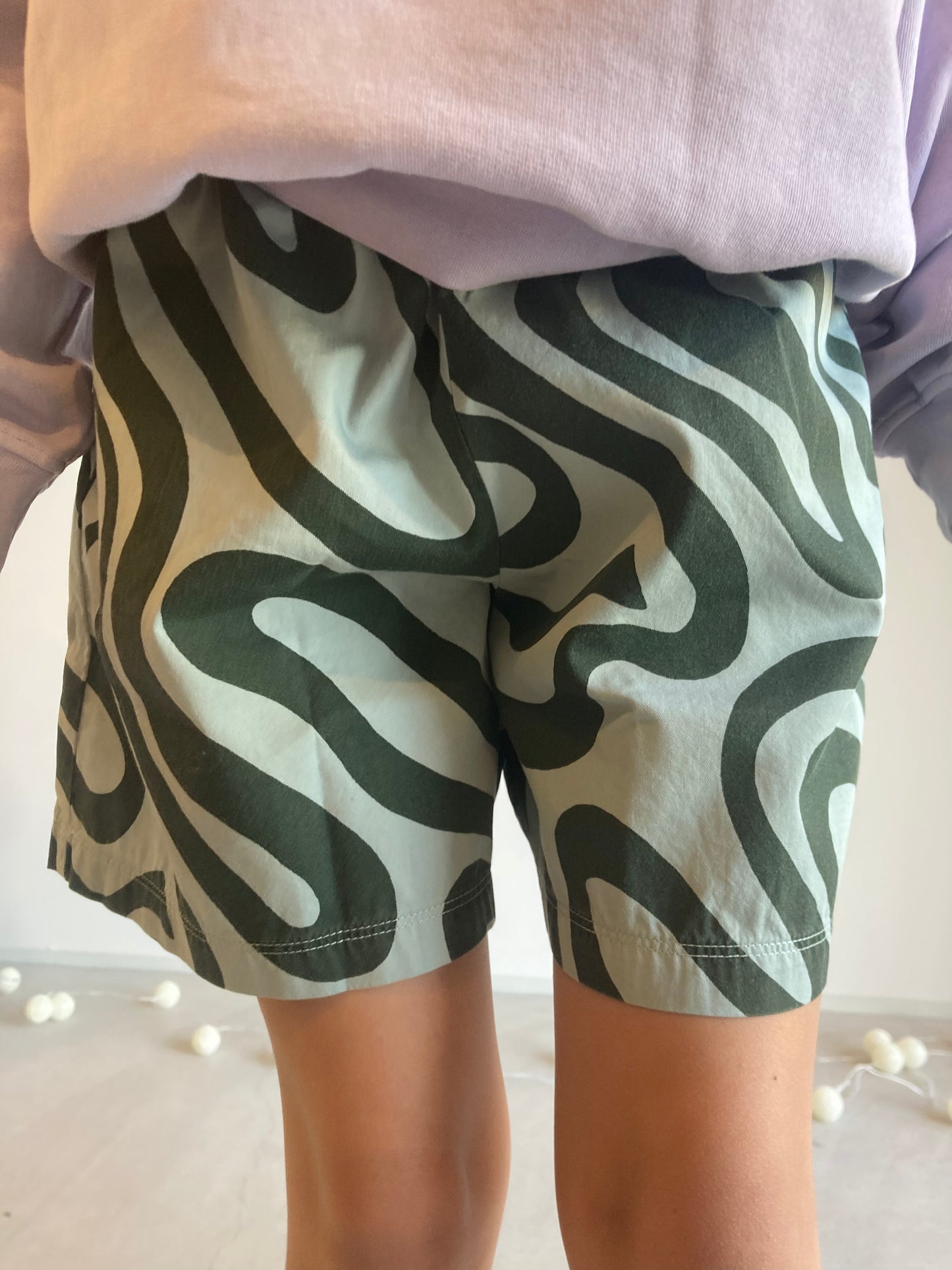 main story / woven short aqua gray