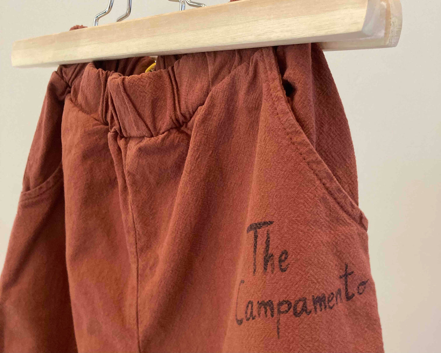 the campamento / brown pants